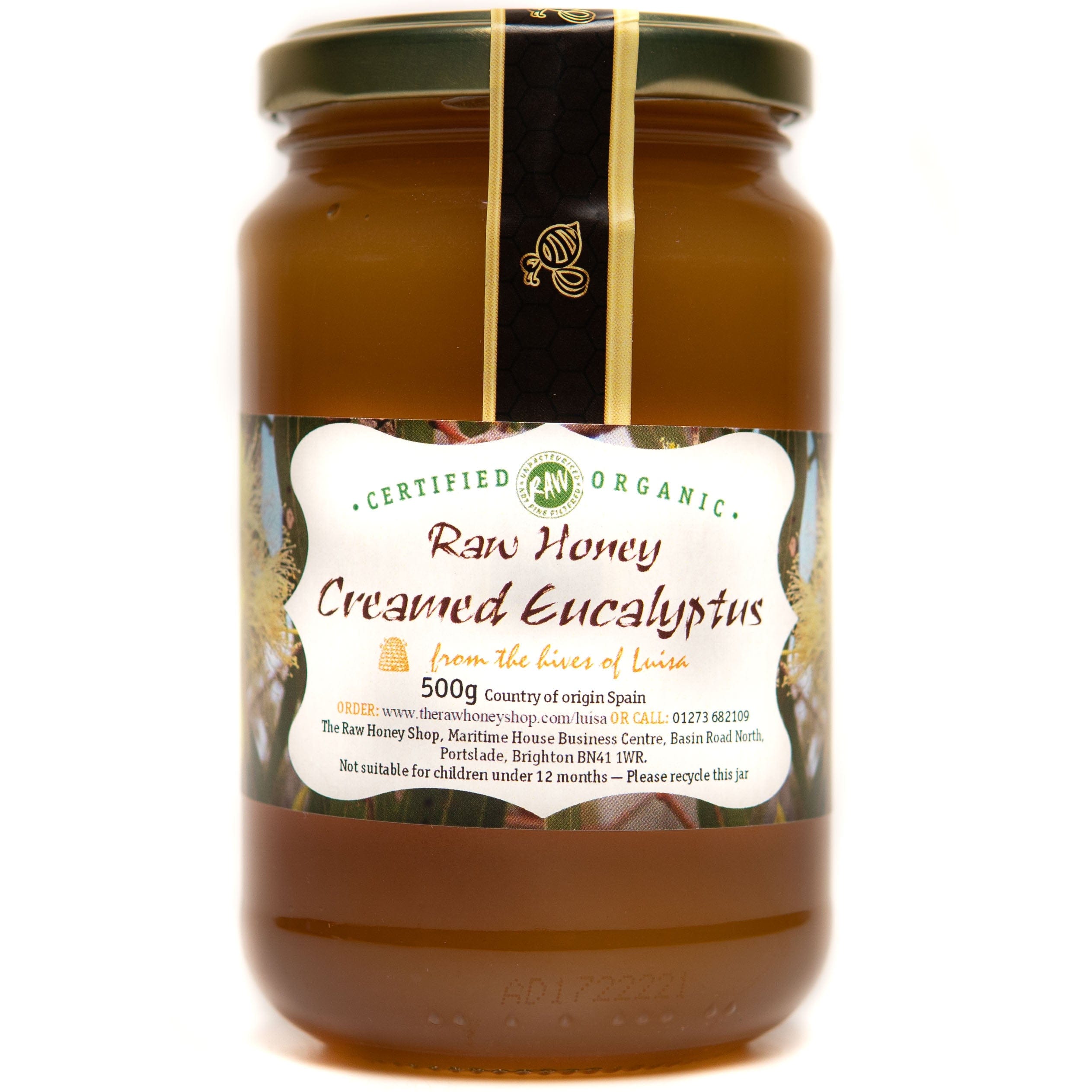 Large glass jar containing 500g of raw organic creamed eucalyptus honey.