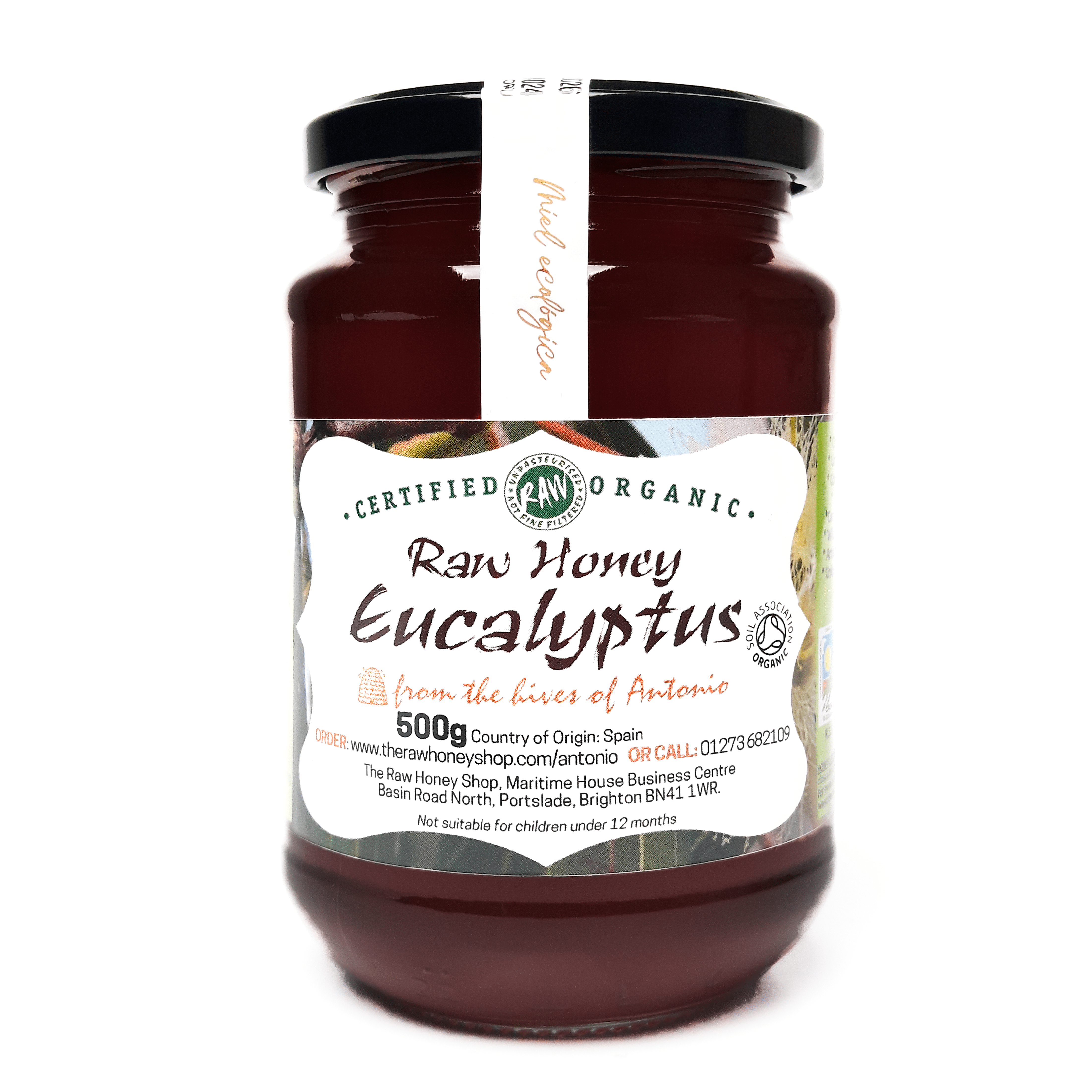 Glass jar containing 500g of raw organic Eucalyptus honey.