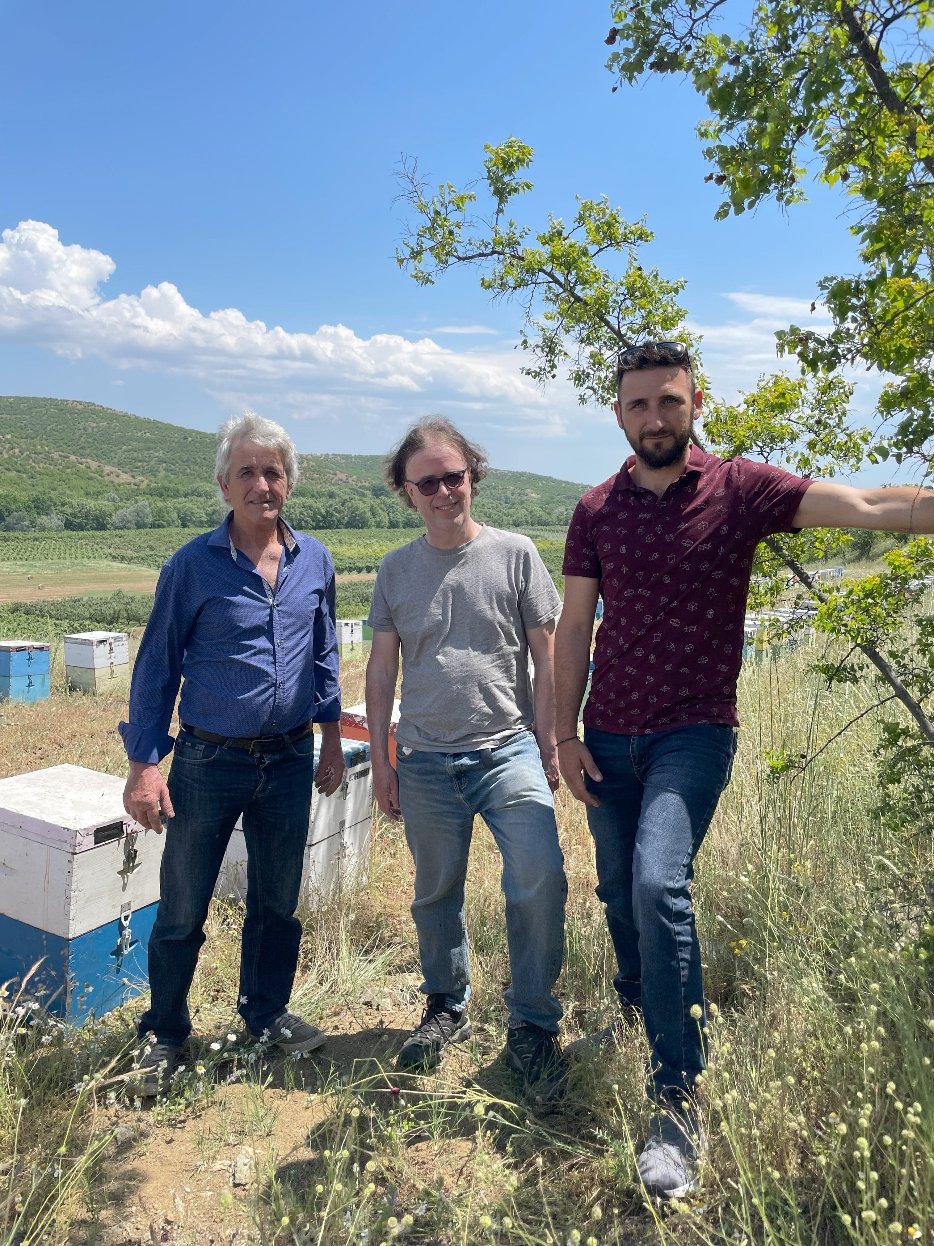 Tim Walker, founder of the raw honey shop, with beekeeper Triantafallus.