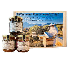 Cardboard box labelled as wilderness raw honey gift set with 3x labelled 250g glass jars containing forest, creamed eucalyptus and creamed heather honeys.