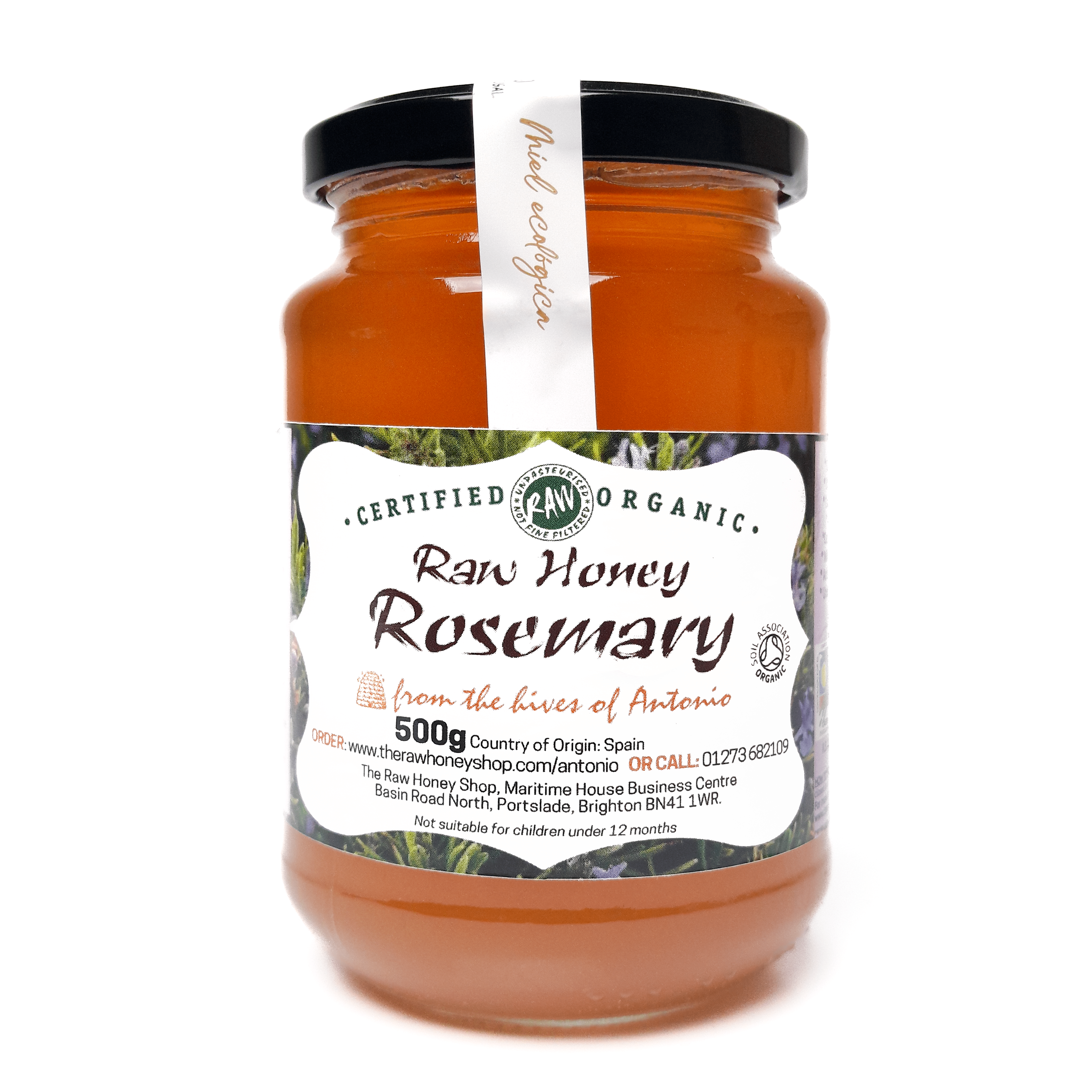 Glass jar containing 500g of raw organic rosemary honey