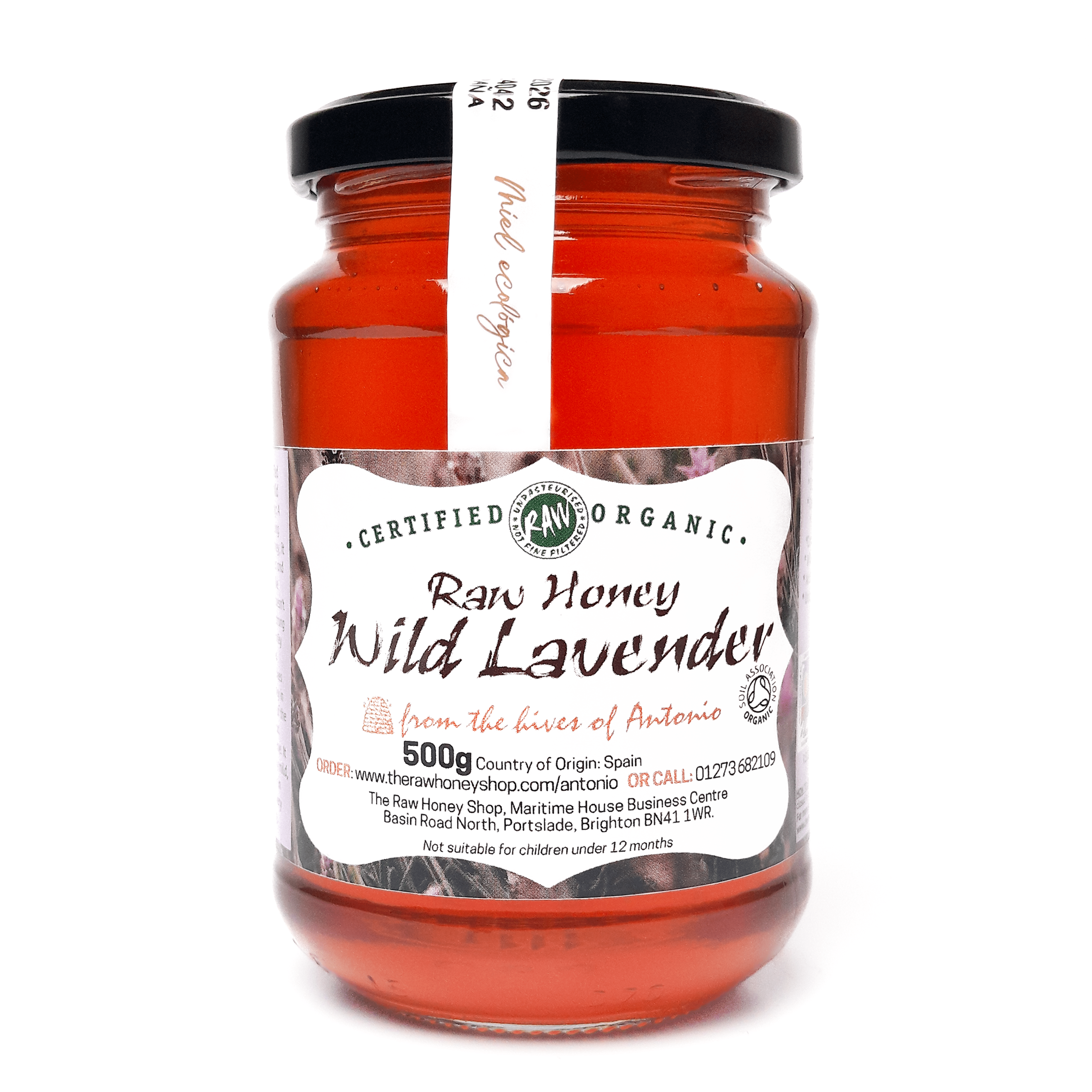 Glass jar containing 500g of raw organic wild lavender honey