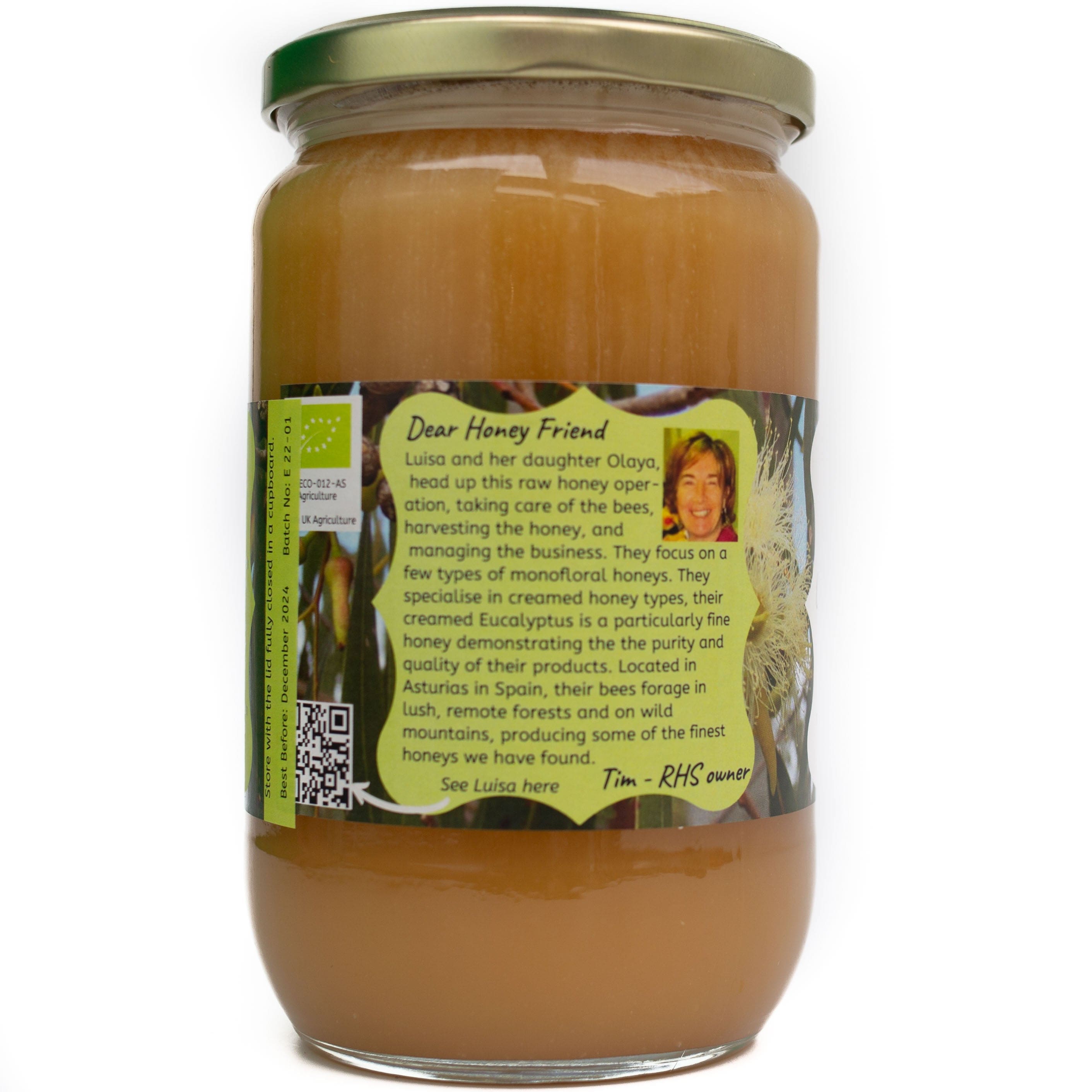 Glass jar with label containing creamed eucalyptus honey.