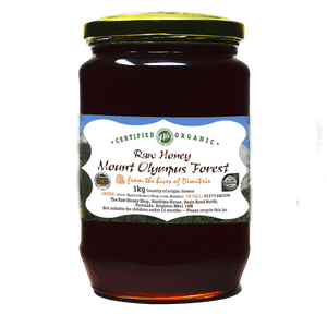 Large labelled glass jar containing 1kg of dark raw organic mount olympus forest honey